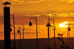 A dynamic photograph of a subject in a natural setting (e.g., hiking or traveling), captured mid-movement.